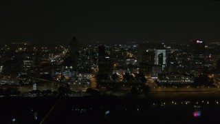 5.7K aerial stock footage of flying by the city's skyline at nighttime, Downtown Memphis, Tennessee Aerial Stock Footage | DX0002_187_073