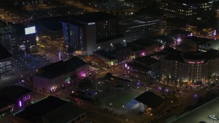 5.7K aerial stock footage of orbiting the Beale Street intersection at nighttime, Downtown Memphis, Tennessee Aerial Stock Footage | DX0002_188_004