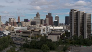 5.7K aerial stock footage a view of the skyline while descending, Downtown Detroit, Michigan Aerial Stock Footage | DX0002_189_020