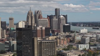 5.7K aerial stock footage of the tall skyscrapers in the city's skyline, Downtown Detroit, Michigan Aerial Stock Footage | DX0002_189_034