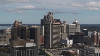 5.7K aerial stock footage of the Patrick V. McNamara Federal Building and skyscrapers, Downtown Detroit, Michigan Aerial Stock Footage | DX0002_189_041