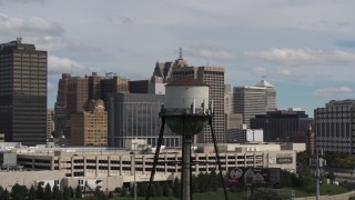 5.7K aerial stock footage of circling a water tower in Downtown Detroit, Michigan Aerial Stock Footage | DX0002_189_045