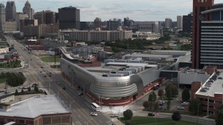 DX0002_190_024 - 5.7K aerial stock footage orbit hotel for view of skyline at the end of Grand River Avenue, Downtown Detroit, Michigan