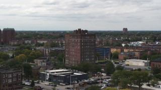 5.7K aerial stock footage of circling a brick apartment building, Detroit, Michigan Aerial Stock Footage | DX0002_190_047