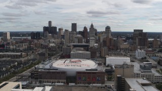 5.7K aerial stock footage a wide view of the city's downtown skyline and arena, Downtown Detroit, Michigan Aerial Stock Footage | DX0002_191_002