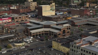 5.7K aerial stock footage circling a farmers market at sunset in Detroit, Michigan Aerial Stock Footage | DX0002_191_048