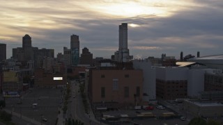 5.7K stock footage aerial of a reverse view of the Detroit Thermal plant at sunset, Downtown Detroit, Michigan Aerial Stock Footage | DX0002_192_030