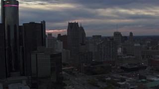 5.7K aerial stock footage flyby GM Renaissance Center and skyscrapers at sunset, Downtown Detroit, Michigan Aerial Stock Footage | DX0002_192_053