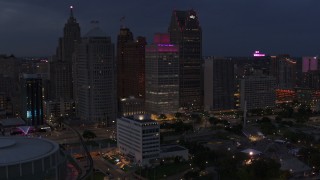 5.7K aerial stock footage of orbiting tall skyscrapers at twilight, Downtown Detroit, Michigan Aerial Stock Footage | DX0002_193_001