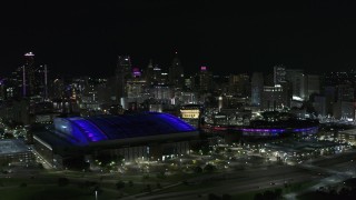 5.7K aerial stock footage of the city's skyline and sports stadiums at night, Downtown Detroit, Michigan Aerial Stock Footage | DX0002_193_042