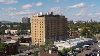 5.7K aerial stock footage of orbiting an apartment building in Detroit, Michigan Aerial Stock Footage | DX0002_194_014