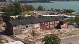 5.7K aerial stock footage of orbiting an abandoned factory building in Detroit, Michigan Aerial Stock Footage | DX0002_194_017