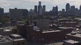 5.7K aerial stock footage of orbiting a brick warehouse building in Detroit, Michigan Aerial Stock Footage | DX0002_194_046