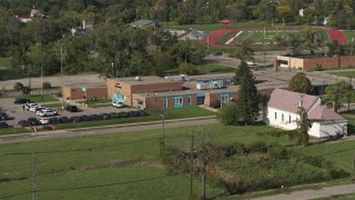 5.7K aerial stock footage orbit and approach a police station in Detroit, Michigan Aerial Stock Footage | DX0002_195_030