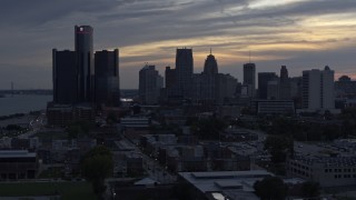 5.7K aerial stock footage of a view of GM Renaissance Center and the skyline at sunset, Downtown Detroit, Michigan Aerial Stock Footage | DX0002_197_036