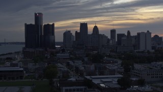 5.7K aerial stock footage flyby GM Renaissance Center and the skyline at sunset, Downtown Detroit, Michigan Aerial Stock Footage | DX0002_197_037