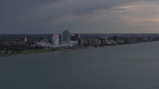 5.7K aerial stock footage of the city's skyline across the river at sunset, Windsor, Ontario, Canada Aerial Stock Footage | DX0002_197_044