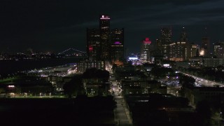 5.7K aerial stock footage focus on GM Renaissance Center during descent at night, Downtown Detroit, Michigan Aerial Stock Footage | DX0002_198_041