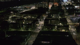 5.7K aerial stock footage of Franklin Street and an apartment complex at night, Downtown Detroit, Michigan Aerial Stock Footage | DX0002_198_055