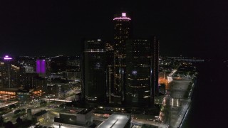 5.7K aerial stock footage orbit and approach GM Renaissance Center at night, Downtown Detroit, Michigan Aerial Stock Footage | DX0002_199_029