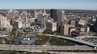 5.7K aerial stock footage approach and fly away from office towers, city buildings in Downtown Buffalo, New York Aerial Stock Footage | DX0002_200_003