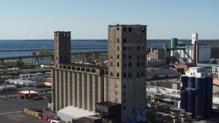 DX0002_201_019 - 5.7K aerial stock footage slowly orbit a grain elevator in Buffalo, New York