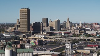 5.7K aerial stock footage of passing by the city's skyline behind Sahlen Field baseball stadium, Downtown Buffalo, New York Aerial Stock Footage | DX0002_201_029