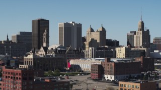 5.7K aerial stock footage of One M&T Plaza while flying near Erie Community College, Downtown Buffalo, New York Aerial Stock Footage | DX0002_202_001