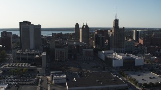 5.7K aerial stock footage ascend toward a trio of office towers in Downtown Buffalo, New York Aerial Stock Footage | DX0002_203_008