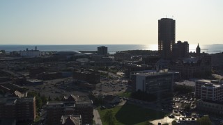 5.7K aerial stock footage flyby police station with view of a skyscraper, Downtown Buffalo, New York Aerial Stock Footage | DX0002_203_013