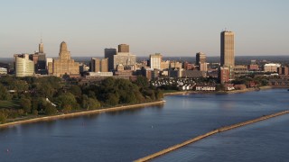 5.7K aerial stock footage of the city's skyline at sunset, seen from Lake Erie, Downtown Buffalo, New York Aerial Stock Footage | DX0002_203_033