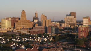 DX0002_204_001 - 5.7K aerial stock footage of city hall beside the Buffalo City Court at sunset, Downtown Buffalo, New York