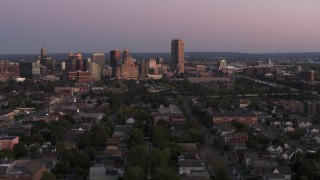 DX0002_204_031 - 5.7K aerial stock footage wide view of Seneca One Tower and the city's skyline at twilight, Downtown Buffalo, New York