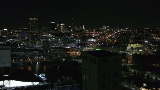 DX0002_205_006 - 5.7K aerial stock footage flyby the skyline at night, reveal grain elevators, Downtown Buffalo, New York