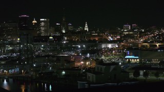 5.7K aerial stock footage of a view of office towers an city buildings at night, Downtown Buffalo, New York Aerial Stock Footage | DX0002_205_031