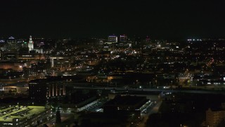 5.7K aerial stock footage of a wide view of Buffalo General Medical Center at night, Downtown Buffalo, New York Aerial Stock Footage | DX0002_205_036