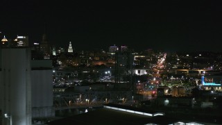 5.7K aerial stock footage of distant Buffalo General Medical Center seen from grain elevators at night, Downtown Buffalo, New York Aerial Stock Footage | DX0002_205_039