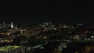 5.7K aerial stock footage of distant Buffalo General Medical Center at night during descent, Downtown Buffalo, New York Aerial Stock Footage | DX0002_205_041