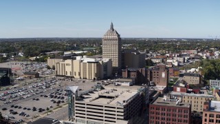 DX0002_206_019 - 5.7K aerial stock footage orbit and approach Kodak Tower and college in Rochester, New York