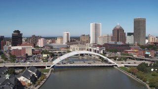 5.7K aerial stock footage approach Douglass-Anthony Bridge and downtown high-rises, Downtown Rochester, New York Aerial Stock Footage | DX0002_207_026