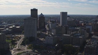 5.7K aerial stock footage ascend and fly away from the city skyline, Downtown Rochester, New York Aerial Stock Footage | DX0002_208_012