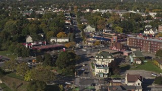 5.7K aerial stock footage flying away from the intersection of Main and Union Streets in Rochester, New York Aerial Stock Footage | DX0002_208_028