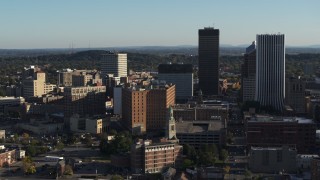 5.7K aerial stock footage orbit apartment building near high-rises, Downtown Rochester, New York Aerial Stock Footage | DX0002_209_003