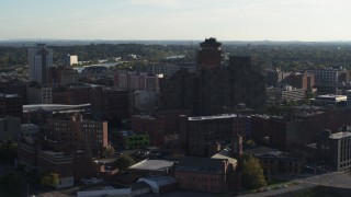 5.7K aerial stock footage of flying by Andrews Terrace apartment building, Downtown Rochester, New York Aerial Stock Footage | DX0002_209_006