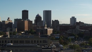 5.7K aerial stock footage of orbit high school and park near skyline, Downtown Rochester, New York Aerial Stock Footage | DX0002_209_008