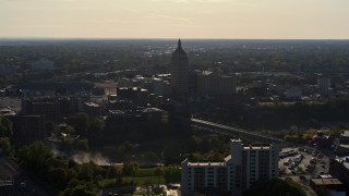 DX0002_209_012 - 5.7K aerial stock footage descend and fly away from Kodak Tower in Rochester, New York