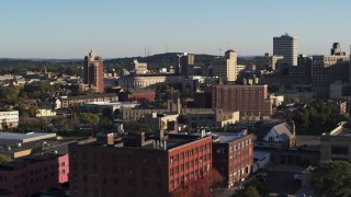 5.7K aerial stock footage of flying by city buildings in Downtown Rochester, New York Aerial Stock Footage | DX0002_209_019