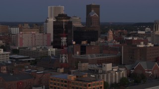 5.7K aerial stock footage of First Federal Plaza, Legacy Tower and radio tower at twilight, Downtown Rochester, New York Aerial Stock Footage | DX0002_210_005