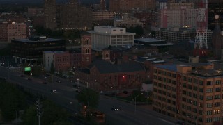 5.7K aerial stock footage of orbiting Spiritus Christi Church at twilight, Downtown Rochester, New York Aerial Stock Footage | DX0002_210_012