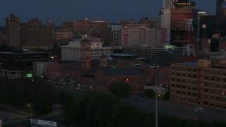 5.7K aerial stock footage of an orbit of Spiritus Christi Church at twilight, Downtown Rochester, New York Aerial Stock Footage | DX0002_210_013